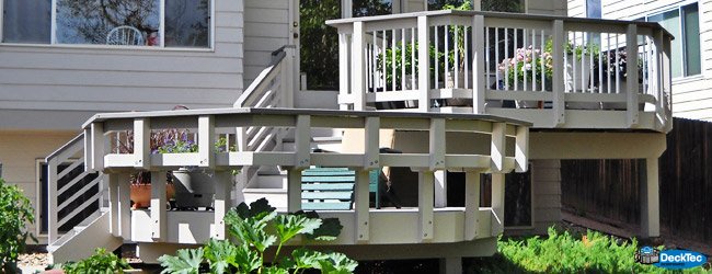 Back decks are a popular and important addition to the home. Give yourself a comfortable place to relax and play with a custom DeckTec deck.