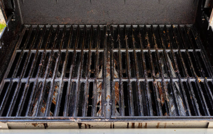 a dirty grill in need of cleaning