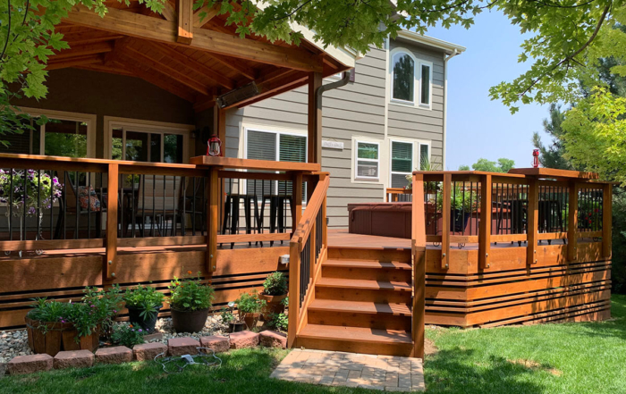 a newly built custom wood deck and roof cover