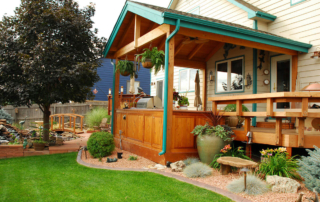 a custom roof covered backyard deck