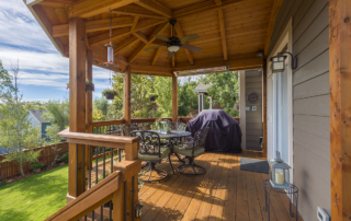 custom wood deck and railings with a custom roof cover