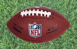 a football sitting on the grass