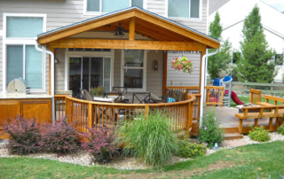 custom made wood deck with a roof cover