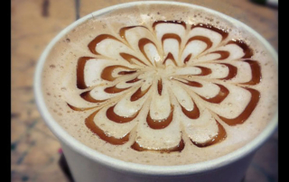 a decorated pumpkin spice latte