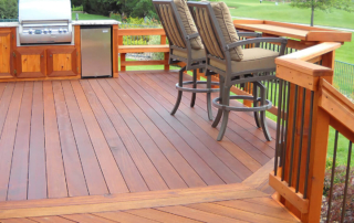 custom wood deck with built in tables and kitchen