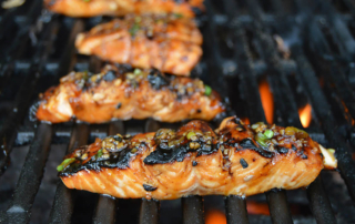 marinated and grilled spicy salmon fillets