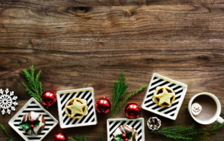 holiday decorations on a wood board