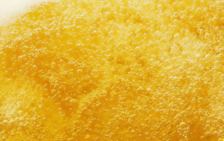 close-up of a bubbling beer