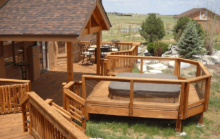 multi-level custom wood deck with built-in spa and roof cover