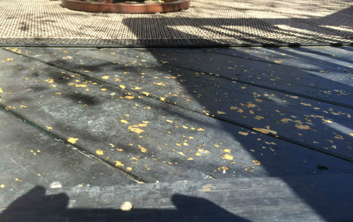 picture of hail damage on a deck