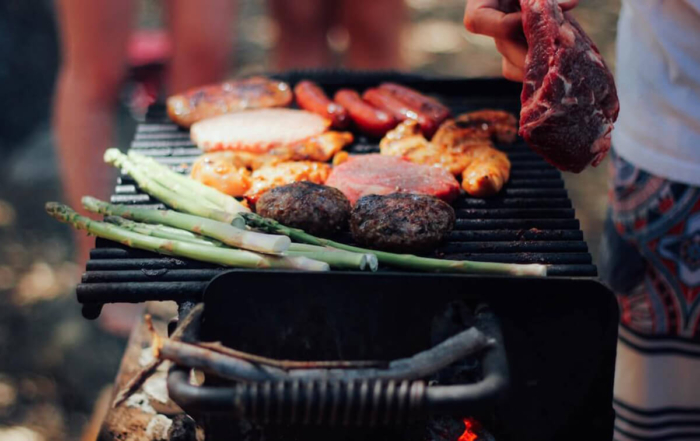 a grill full of food