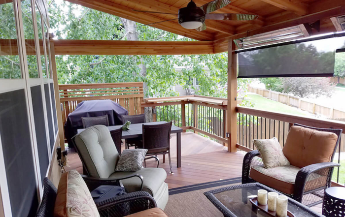 a roof covered wooden deck