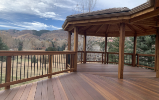 beautiful mahogany deck leading out to a gazebo