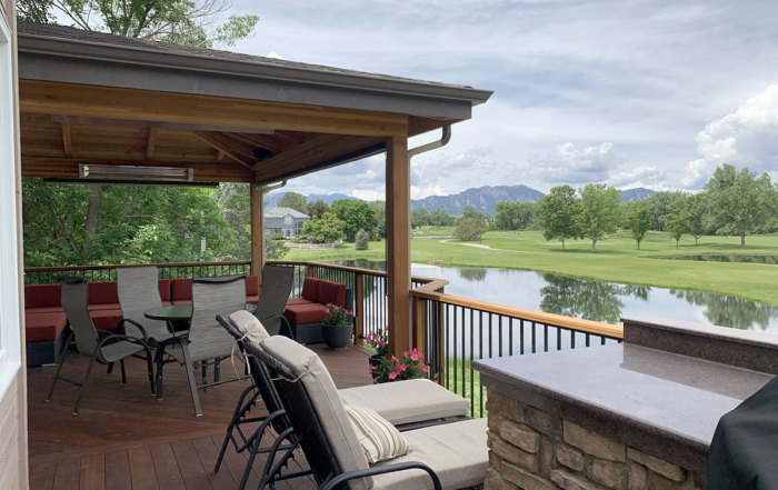 stained wood deck with a roof cover with a beautiful view