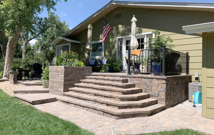 multi-leveled wrap around paver patio