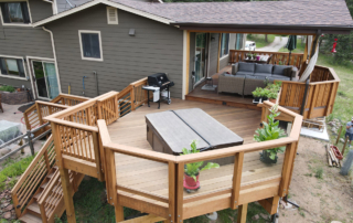 elevated wood deck with roof cover and custom staircase